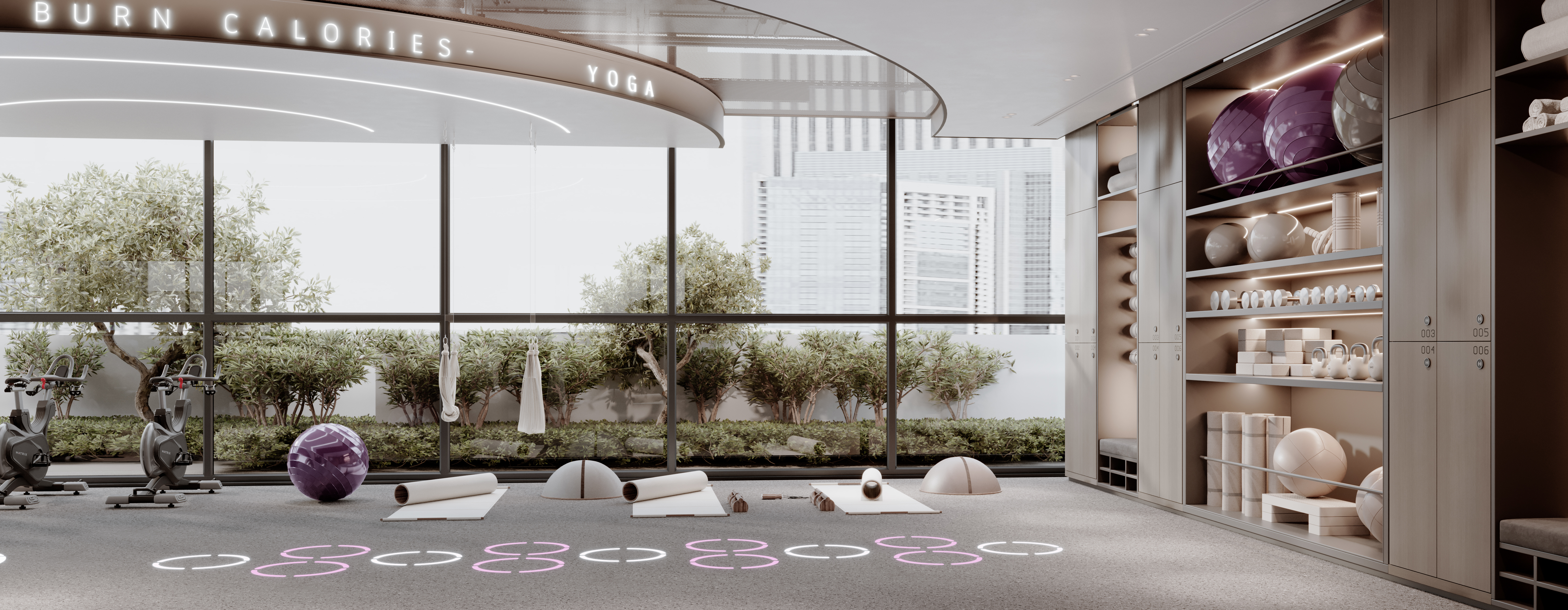 Le Blanc A modern yoga studio featuring fitness equipment, exercise mats, and large windows with indoor greenery.